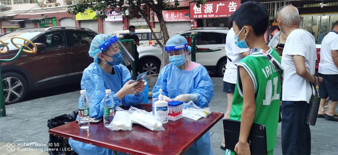 电信志愿者协同社区核酸检测工作.jpg